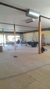 A wood frame building which we had to bring up to code. We fire rated the ceiling and added a new subfloor